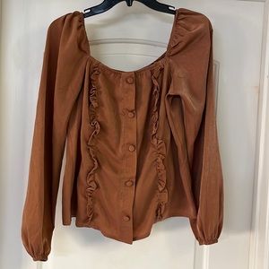 NWT Rust color long sleeve blouse w/decorative buttons and front ruffles